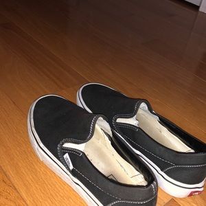 Black Slip on Vans. For guys and girls. (gender neutral)